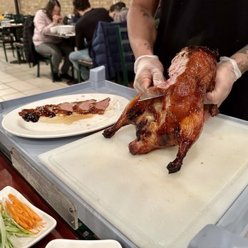 Sun Wah Bar-B-Que - Slicing duck at the table - Barbeque Near Me - Chicago, Illinois