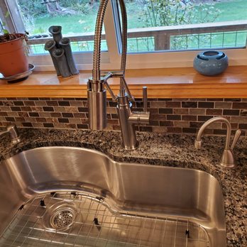 Plumbing Repair Services - New sink and faucet with articulating arm. - Plumbing Near Me