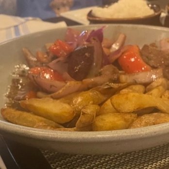 Coracora - Lomo Saltado - stir fried tenderloin - Latin American Near Me - West Hartford, Connecticut Coracora - Lomo Saltado - stir fried tenderloin - Latin American Near Me - West Hartford, Connecticut