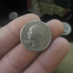 The Coin Shop - 1965 quarter without a mint mark it's very rare