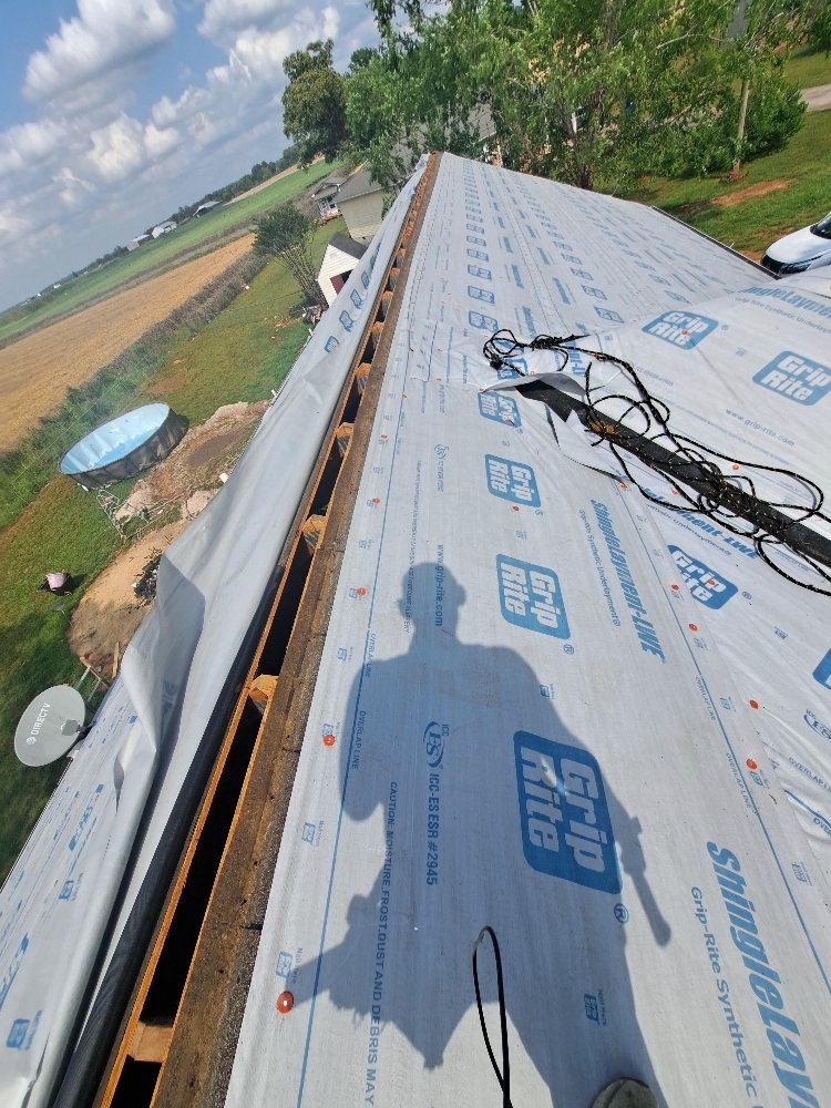 Slide of Mike's roofing and repairs