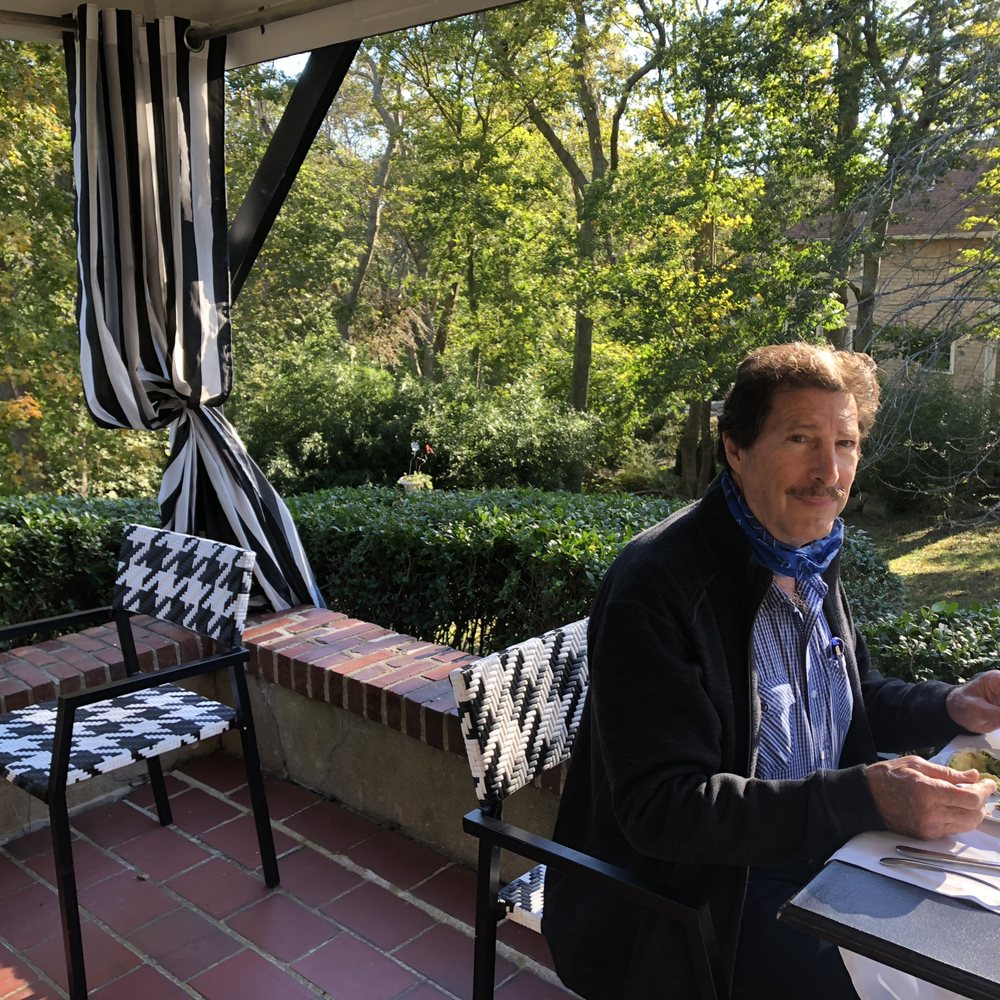 Nobnocket Boutique Inn - My husband enjoying breakfast on the outdoor patio - Hotels Near Me - Vineyard Haven, Massachusetts