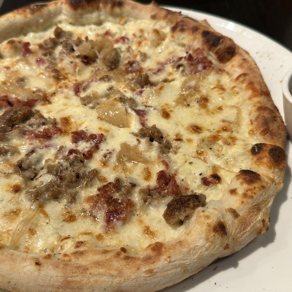 Graffito Pizza - The Rck. Very unique pizza. Lots of great flavors. Plenty for 2. - Pizza Near Me - Savannah, Georgia Graffito Pizza - The Rck. Very unique pizza. Lots of great flavors. Plenty for 2. - Pizza Near Me - Savannah, Georgia