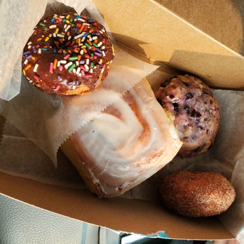 Skaneateles Bakery - Chocolate sprinkle donut, cinnamon bun, blueberry scone, and cinnamon sugar donut - Bakeries Near Me - Skaneateles, New York Skaneateles Bakery - Chocolate sprinkle donut, cinnamon bun, blueberry scone, and cinnamon sugar donut - Bakeries Near Me - Skaneateles, New York