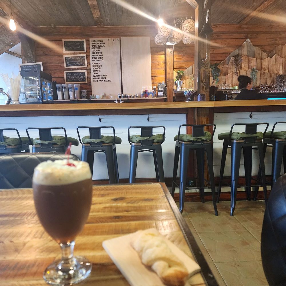 Tiki Java Jax - Mango Tango and cheese pastry - Coffee & Tea Near Me - Jacksonville, Florida Tiki Java Jax - Mango Tango and cheese pastry - Coffee & Tea Near Me - Jacksonville, Florida