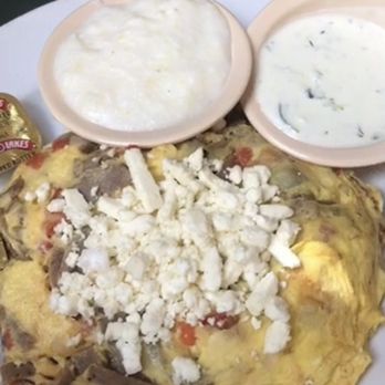 Sara's Kitchen - Theo's Theo 's Omelette w/ Tzatsiki and side of grits - Breakfast & Brunch Near Me - Palm Beach Gardens, Florida Sara's Kitchen - Theo's Theo 's Omelette w/ Tzatsiki and side of grits - Breakfast & Brunch Near Me - Palm Beach Gardens, Florida