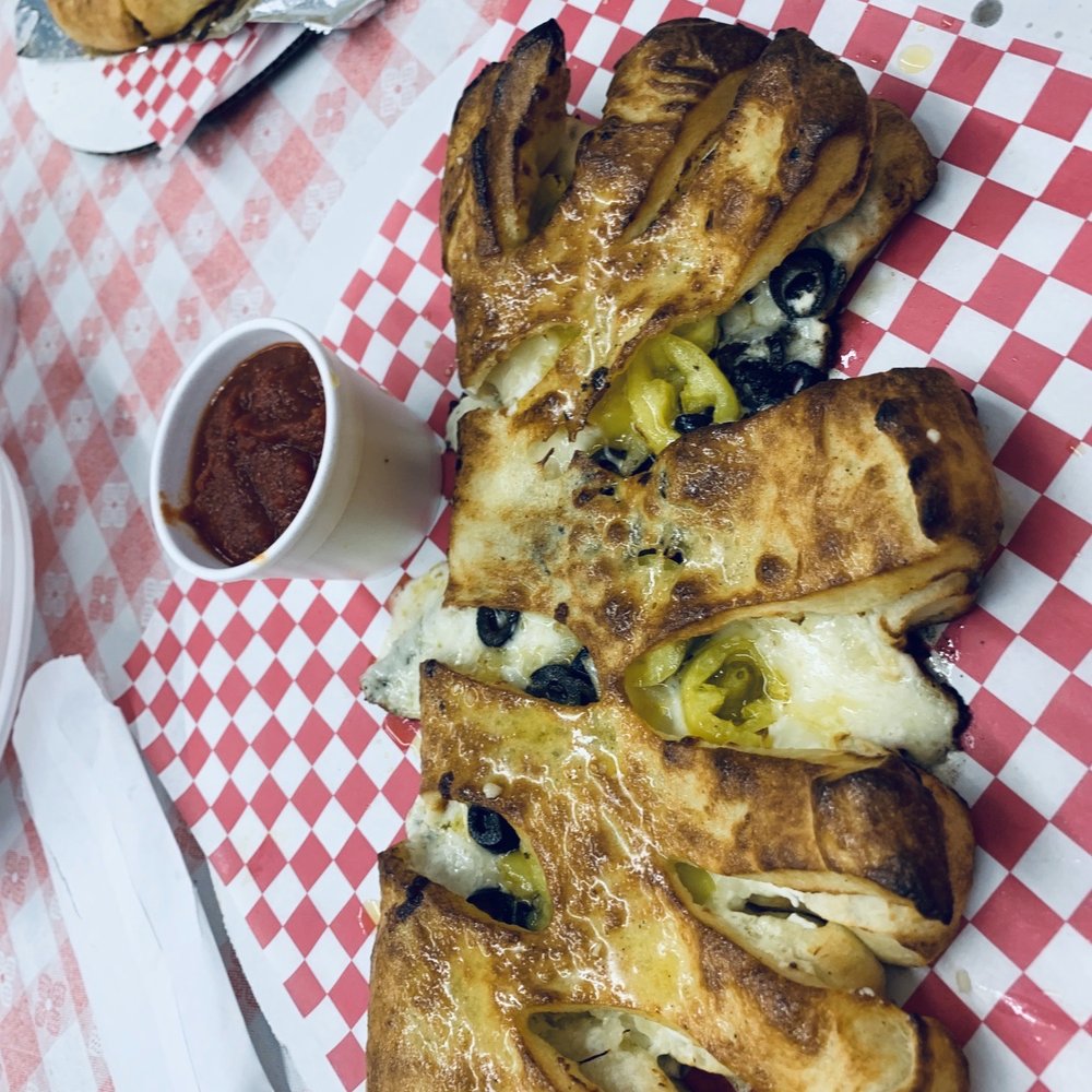Pepperoni's Pizza - Mouth-watering calzone! Sorry it's sideways. - Pizza Near Me - Monroe, North Carolina Pepperoni's Pizza - Mouth-watering calzone! Sorry it's sideways. - Pizza Near Me - Monroe, North Carolina