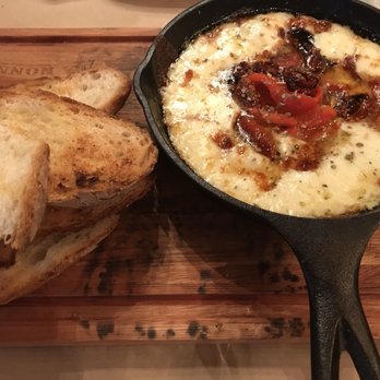 La Nonna - Provoleta. So good you could solely come to this restaurant for it and it would be worth it. This pic was taken a bit ago but still good! - Argentine Near Me - Chicago, Illinois