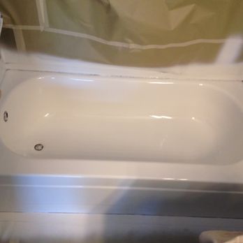 Bath Masters - the tub being installed in the bathroom - Refinishing Services Near Me - Robertsdale , Alabama
