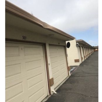 Two Friends Movers - A set of garages with roof damage caused by the Two Friends Movers truck. - Movers Near Me - Redwood City, California Two Friends Movers - A set of garages with roof damage caused by the Two Friends Movers truck. - Movers Near Me - Redwood City, California