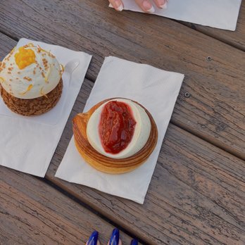 Twisted Croissant - Passion, Mango & Guava Cream Puff on the left and Strawberry & Rhubarb Croissant on the right - Bakeries Near Me - Portland, Oregon Twisted Croissant - Passion, Mango & Guava Cream Puff on the left and Strawberry & Rhubarb Croissant on the right - Bakeries Near Me - Portland, Oregon