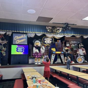 Chuck E. Cheese - Interior and the stage where Chucky appears. It was quite an entertainment for us all.. - Pizza Near Me - Northridge, California