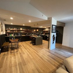 Sherwin-Williams Paint Store - White: Greek Villa Cabinets and half black trim: Tricorn Black Gray on the back wall : custom color to match tile