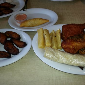 Pollo Campero - Mucho sabor! Clockwise from top; empanada, yucca fries, spicy fried chicken, roast chicken, maiz tortillas, and platanos. - Latin American Near Me - Farmers Branch, Texas