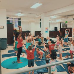 Adventures on The Hill Summer Camp - Takoma - Weekly Yoga session with our certified ComsoKids Yoga instructor