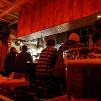 Natt Spil - a group of people sitting at a bar - Pizza Near Me - Madison, Wisconsin Natt Spil - a group of people sitting at a bar - Pizza Near Me - Madison, Wisconsin