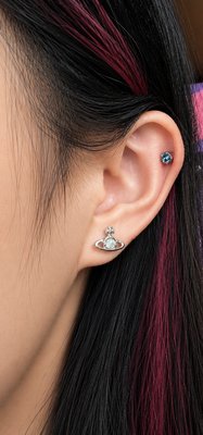 Piercing - Curated ear piercing with implant- grade titanium jewelry in a private boutique studio Piercing - Curated ear piercing with implant- grade titanium jewelry in a private boutique studio