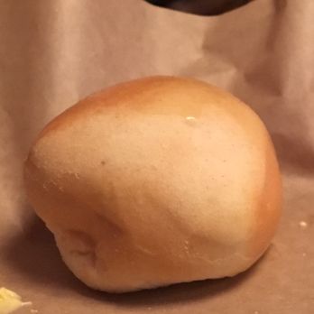 Santa Fe Cattle - This roll has a spirit and it won't stop telling me to eat it. - Steakhouses Near Me - Albertville, Alabama