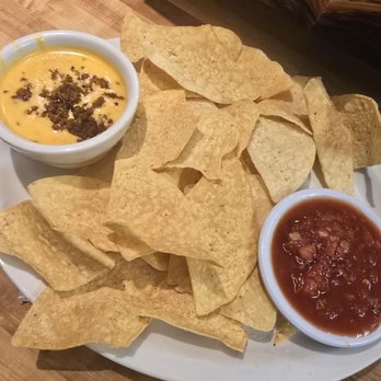 Cheddar's Scratch Kitchen - Chips & Homemade Queso with ground beef - Comfort Food Near Me - Denton, Texas Cheddar's Scratch Kitchen - Chips & Homemade Queso with ground beef - Comfort Food Near Me - Denton, Texas