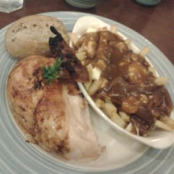 Swiss Chalet Rotisserie & Grill - Quarter chicken with side of poutine