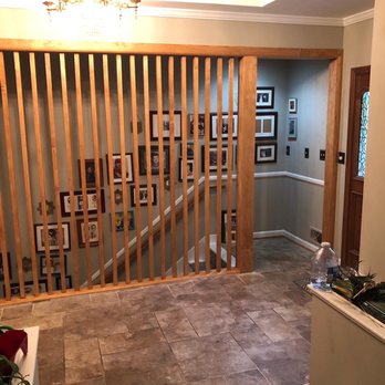 M Remodeling - a living room with a staircase - Tiling Near Me M Remodeling - a living room with a staircase - Tiling Near Me