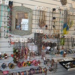Global Gifts - Walls of jewelry to select from.