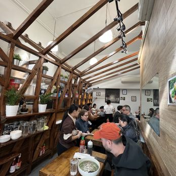 Pho 39 - a group of people eating in a restaurant - Vietnamese Near Me - New York, New York
