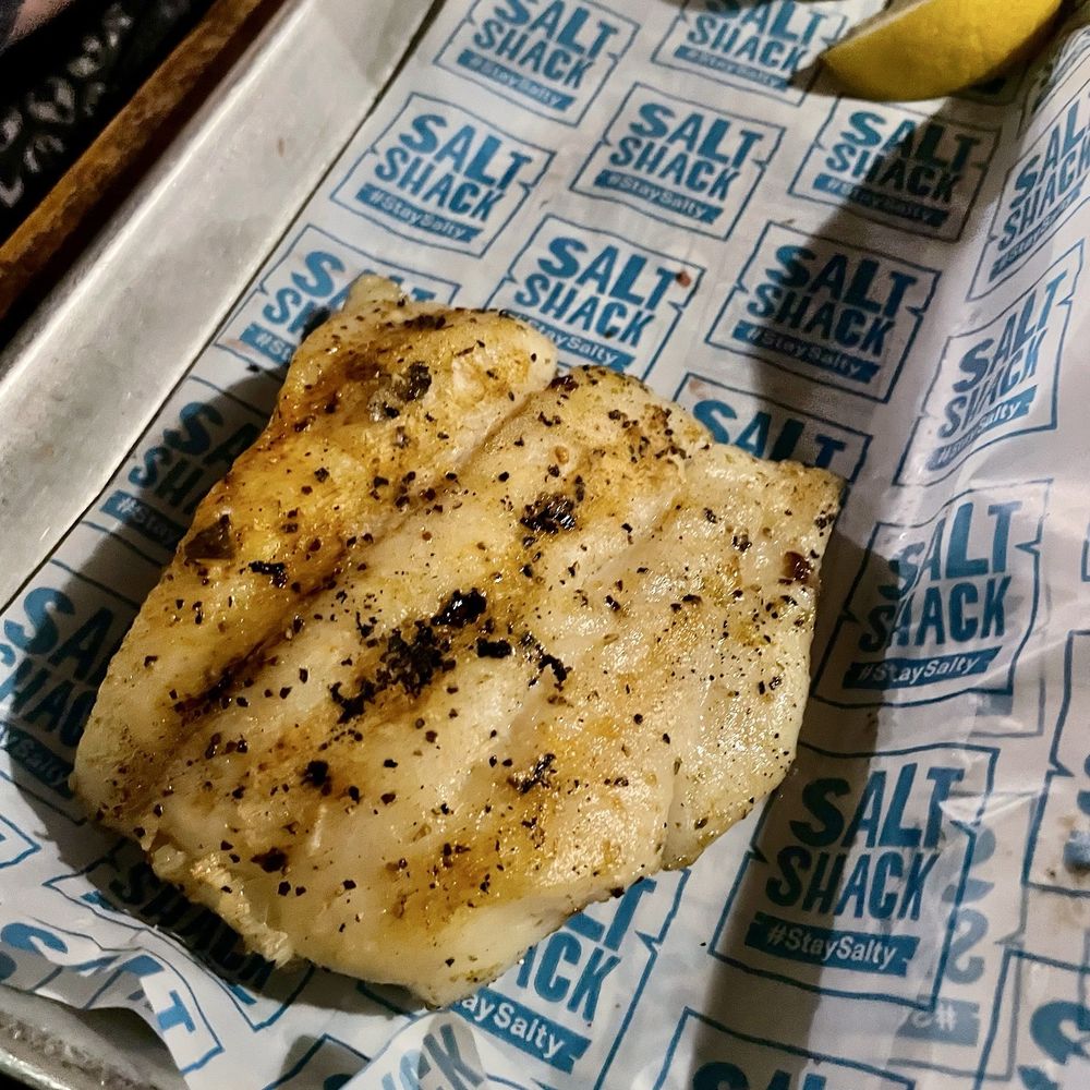Salt Shack - Grilled Grouper. Great sauce. (Normally a side would be there but we picked the Caesar salad so it was separate.) - Seafood Near Me - Clermont, Florida Salt Shack - Grilled Grouper. Great sauce. (Normally a side would be there but we picked the Caesar salad so it was separate.) - Seafood Near Me - Clermont, Florida