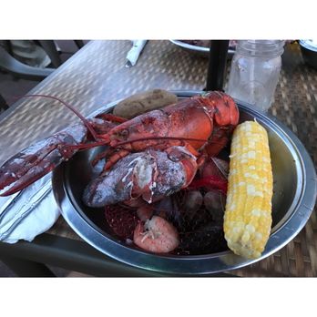 Buoy One - Riverhead - 2 lb Lobster, clams, shrimp mussels, baked potato! Clam Bake Pot! Awesome!! - Seafood Near Me - Riverhead, New York