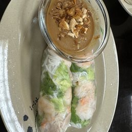 Spring rolls. They put fried shallots and whole peanuts in the peanut sauce so it was extra delish! Spring rolls. They put fried shallots and whole peanuts in the peanut sauce so it was extra delish!