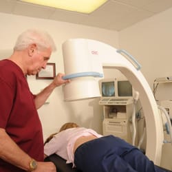 Neuropathy and Pain Centers of Las Vegas - Dr Odell taking an Xray of a patient's back