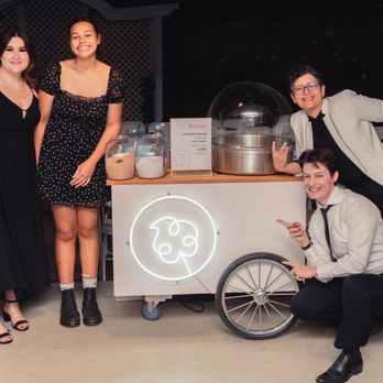 Wonder Cotton Candy - The friendly staff member and some wedding guests :) the cart is so cute! - Caterers Near Me - San Jose, California Wonder Cotton Candy - The friendly staff member and some wedding guests :) the cart is so cute! - Caterers Near Me - San Jose, California