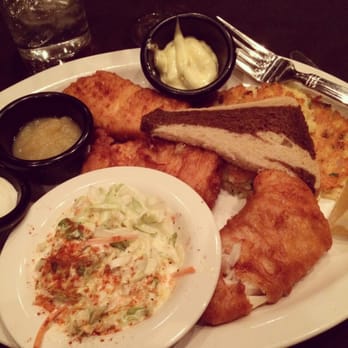 680 North - 3 piece haddock, potato pancakes with applesauce and sour cream, rye bread and slaw. - New American Near Me - Green Lake, Wisconsin 680 North - 3 piece haddock, potato pancakes with applesauce and sour cream, rye bread and slaw. - New American Near Me - Green Lake, Wisconsin