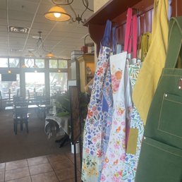 Indoors at Kneadets has little charming touches everywhere, like these aprons!