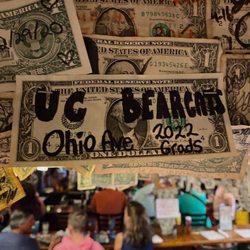 Siesta Key Oyster Bar - Dollars hung on walls and ceiling
