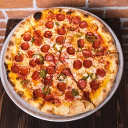 Beauties - Sweet Satan! Our most popular pizza with cup and char pepperoni and jalapeños, finished with chilli honey