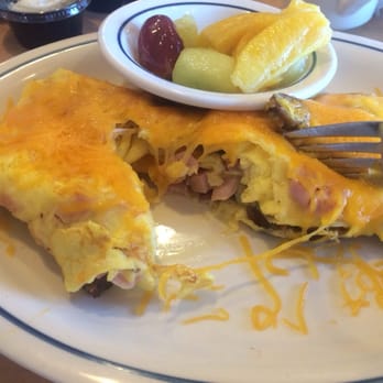 IHOP - Magical Animal Omelet with bacon, ham and sausage. Nommy - Breakfast & Brunch Near Me - DENHAM SPRINGS, Louisiana