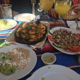 Shrimp fajitas, shrimp ceviche, guacamole and beans