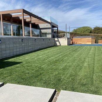 Johnny's Landscape & Maintenance - a backyard with artificial grass - Landscaping Near Me - Spring Valley, California Johnny's Landscape & Maintenance - a backyard with artificial grass - Landscaping Near Me - Spring Valley, California