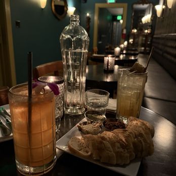 The In Between - Drinks and hummus plate - Cocktail Bars Near Me - Port Townsend, Washington The In Between - Drinks and hummus plate - Cocktail Bars Near Me - Port Townsend, Washington