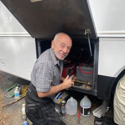 Joe Battery Service - Joe installing batteries in our Diesel pusher motorhome