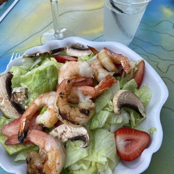 Capri Fish House - Spinach shrimp strawberry salad with iceberg since they didn't have spinach. Very good. - Seafood Near Me - Naples, Florida Capri Fish House - Spinach shrimp strawberry salad with iceberg since they didn't have spinach. Very good. - Seafood Near Me - Naples, Florida