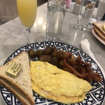 Orange Blossom - Orange blossom omelette, potatoes, bacon, toast and a Mimosa - Breakfast & Brunch Near Me - Miami Beach, Florida Orange Blossom - Orange blossom omelette, potatoes, bacon, toast and a Mimosa - Breakfast & Brunch Near Me - Miami Beach, Florida