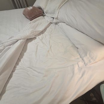 Liquid Life Vacation Rentals - How bed was "made" upon arrival to San Carlos 1108 - Vacation Rentals Near Me - Orange Beach, Alabama