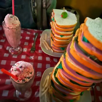 Replay Lincoln Park - a large stack of sandwiches on a table - Arcades Near Me - Chicago, Illinois Replay Lincoln Park - a large stack of sandwiches on a table - Arcades Near Me - Chicago, Illinois