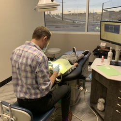 Colorado Children's Dental Center - Dr. Jones doing a patient's checkup.