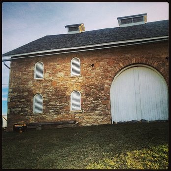 Historic Taylor Barn - The white doors on the north side create a nice backdrop for ceremonies. with a slight incline which is a natural stage. - Venues & Event Spaces Near Me - Lawrence, Kansas Historic Taylor Barn - The white doors on the north side create a nice backdrop for ceremonies. with a slight incline which is a natural stage. - Venues & Event Spaces Near Me - Lawrence, Kansas