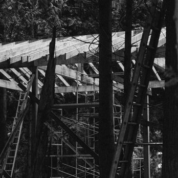Spruce Properties - a black and white photo of a house under construction - General Contractors Near Me - Poulsbo, Washington Spruce Properties - a black and white photo of a house under construction - General Contractors Near Me - Poulsbo, Washington