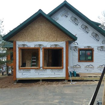 Troy Griffin Construction - Scanlog hand hewn trim and corners on a project in process. - General Contractors Near Me - Gordon, Wisconsin Troy Griffin Construction - Scanlog hand hewn trim and corners on a project in process. - General Contractors Near Me - Gordon, Wisconsin