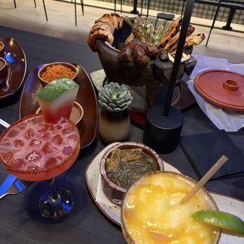 Patrones Taqueria & Bar - Molcajete for 2. Frozen mango margarita & watermelon margarita - Mexican Near Me - Atlanta, Georgia Patrones Taqueria & Bar - Molcajete for 2. Frozen mango margarita & watermelon margarita - Mexican Near Me - Atlanta, Georgia